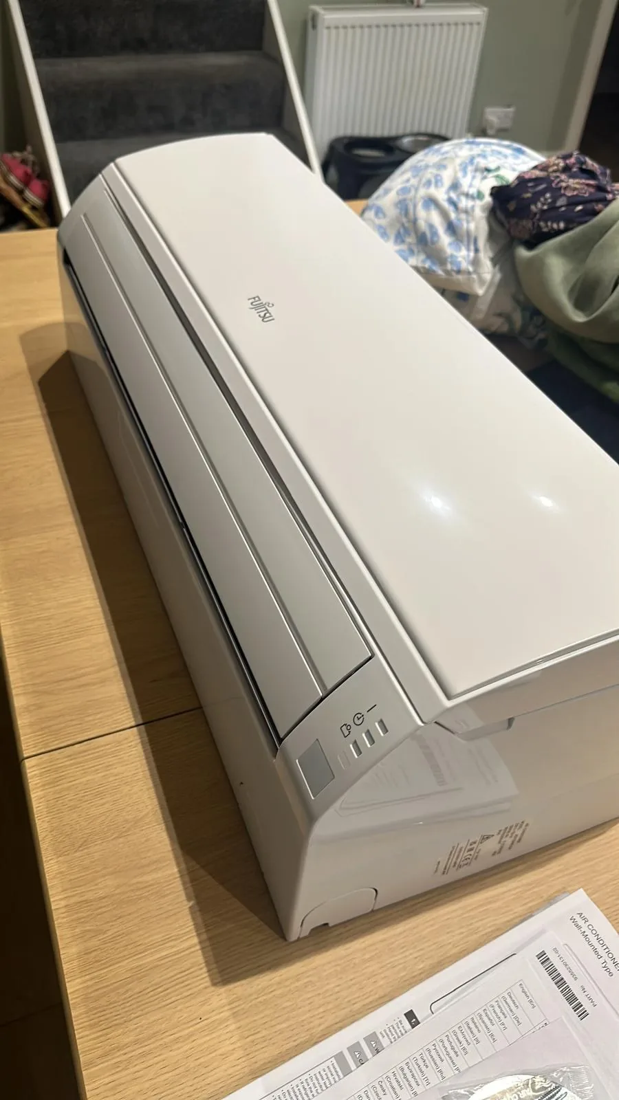 Fujitsu wall-mounted air-conditioning indoor unit fitted in a home